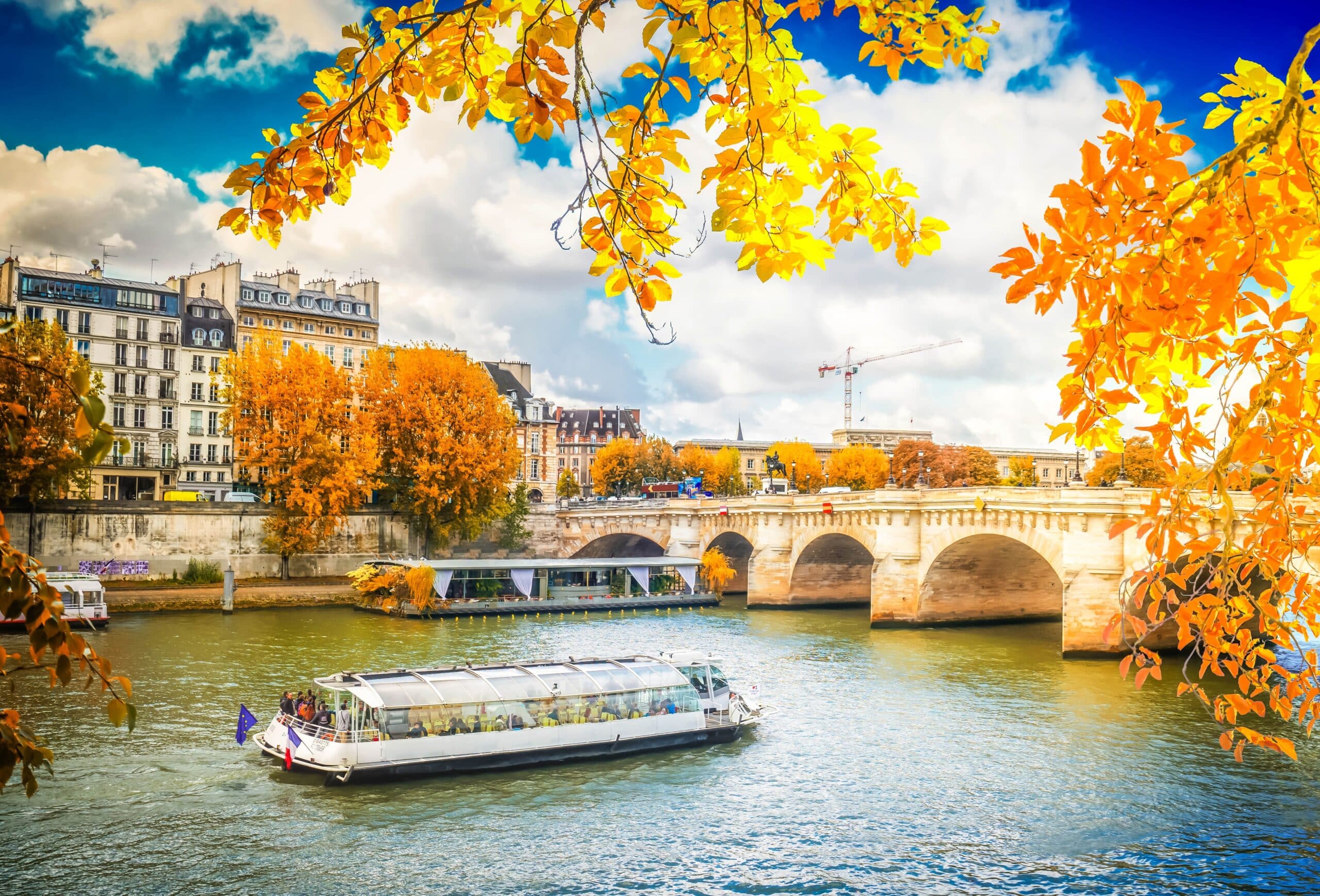 Pont,Neuf,And,River,Seine,Waters,With,Cruise,Ship,,Blue